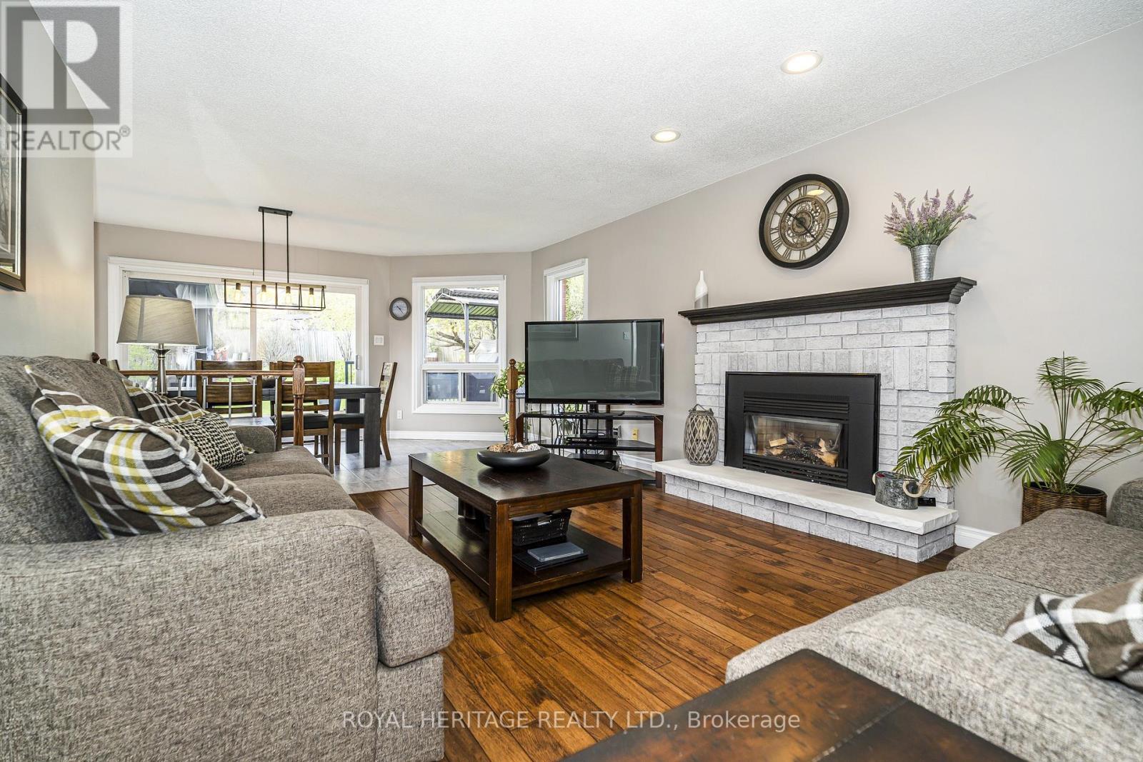 View 2 - 525 Sundown Crescent, Pickering, ON - Indoor Photo Showing Living Room With Fireplace