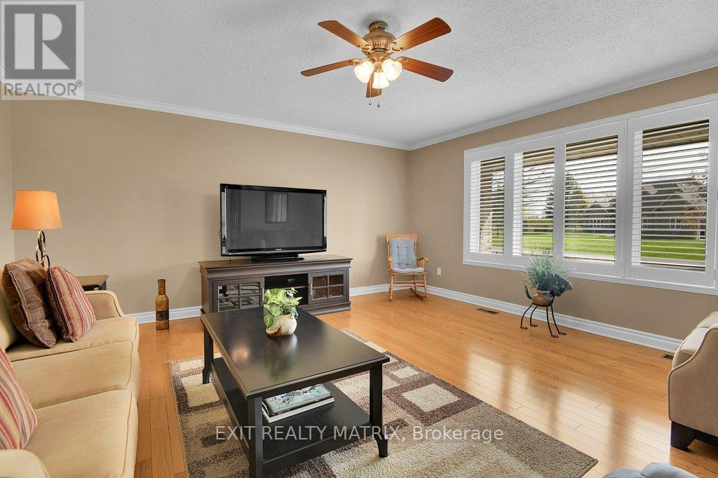 Bright main floor family room. - 1340 Cuthbert Way, Ottawa, ON - Indoor Photo Showing Living Room
