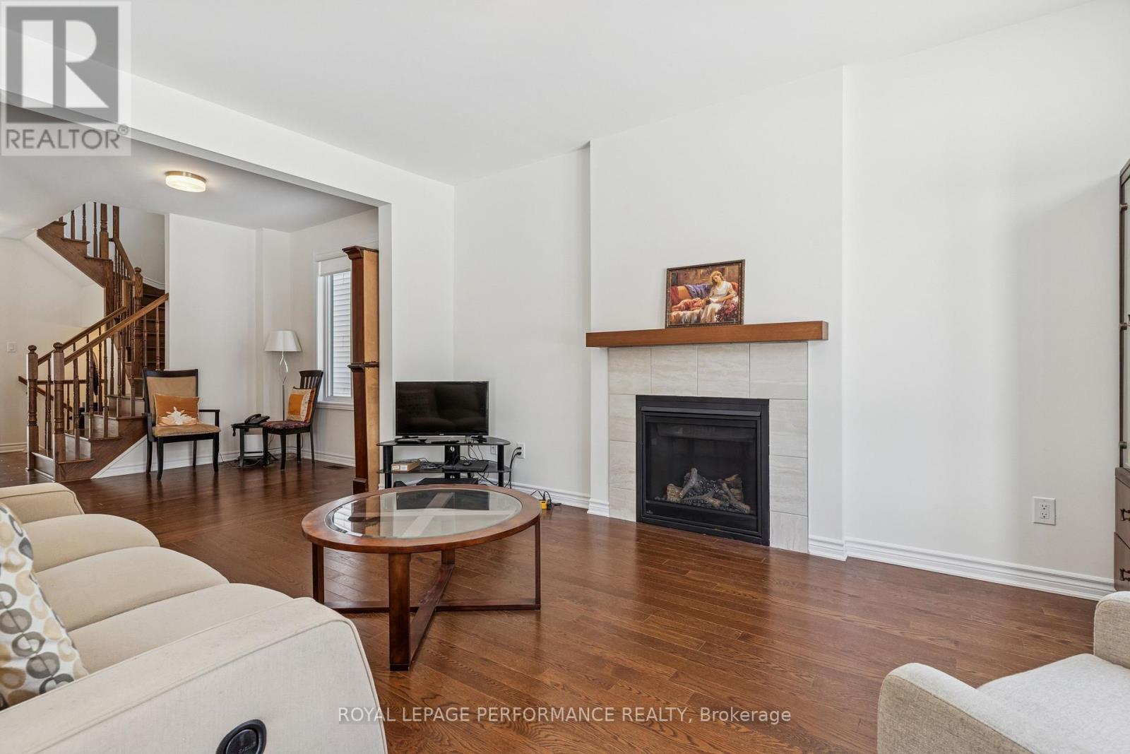 845 Snap Hook Crescent, Ottawa, ON - Indoor Photo Showing Living Room With Fireplace