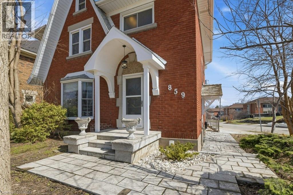 Step inside this beautifully updated classic home - 859 Queen'S Boulevard, Kitchener, ON - Outdoor