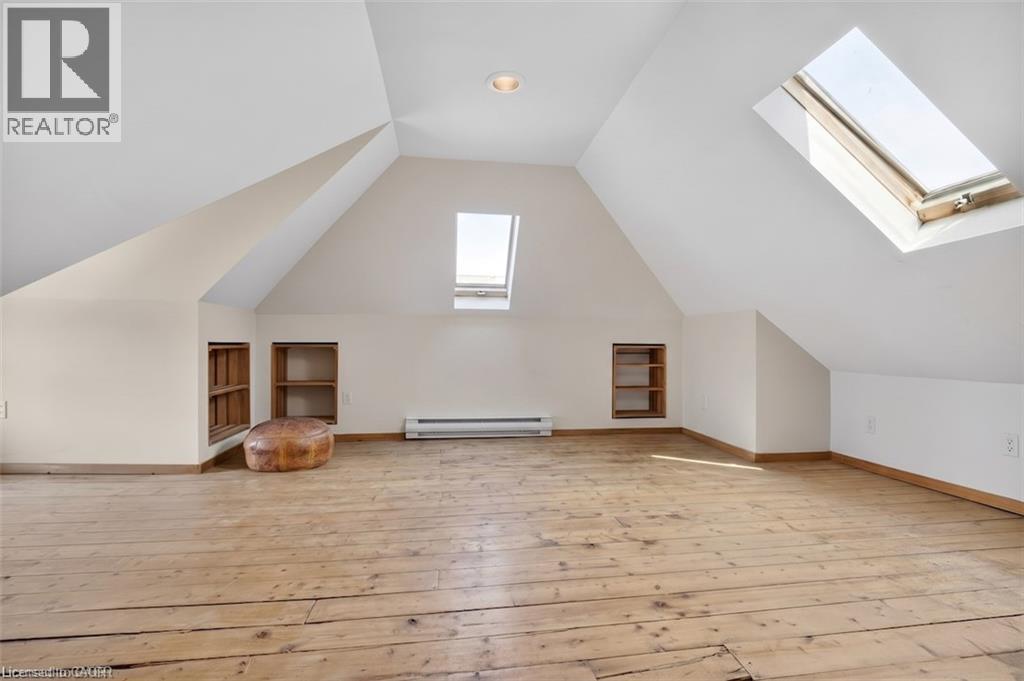 Sun-drenched loft space is perfect for a bedroom, studio, or office - 859 Queen'S Boulevard, Kitchener, ON - Indoor Photo Showing Other Room