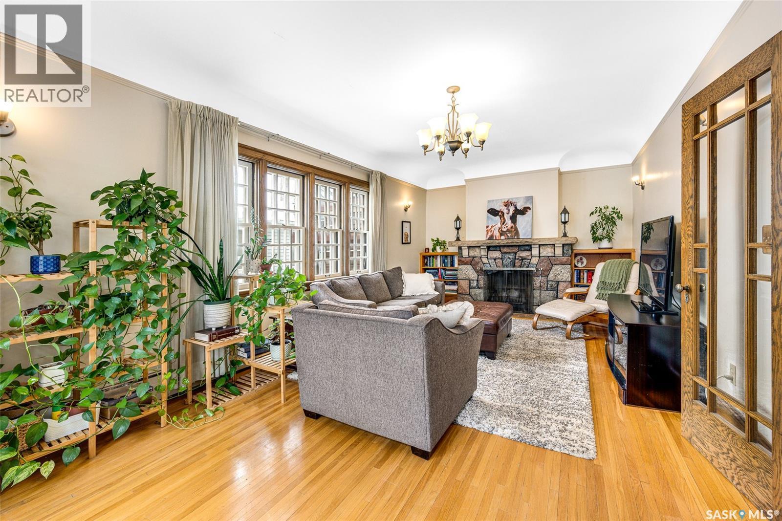 1325 Elliott Street, Saskatoon, SK - Indoor Photo Showing Living Room With Fireplace