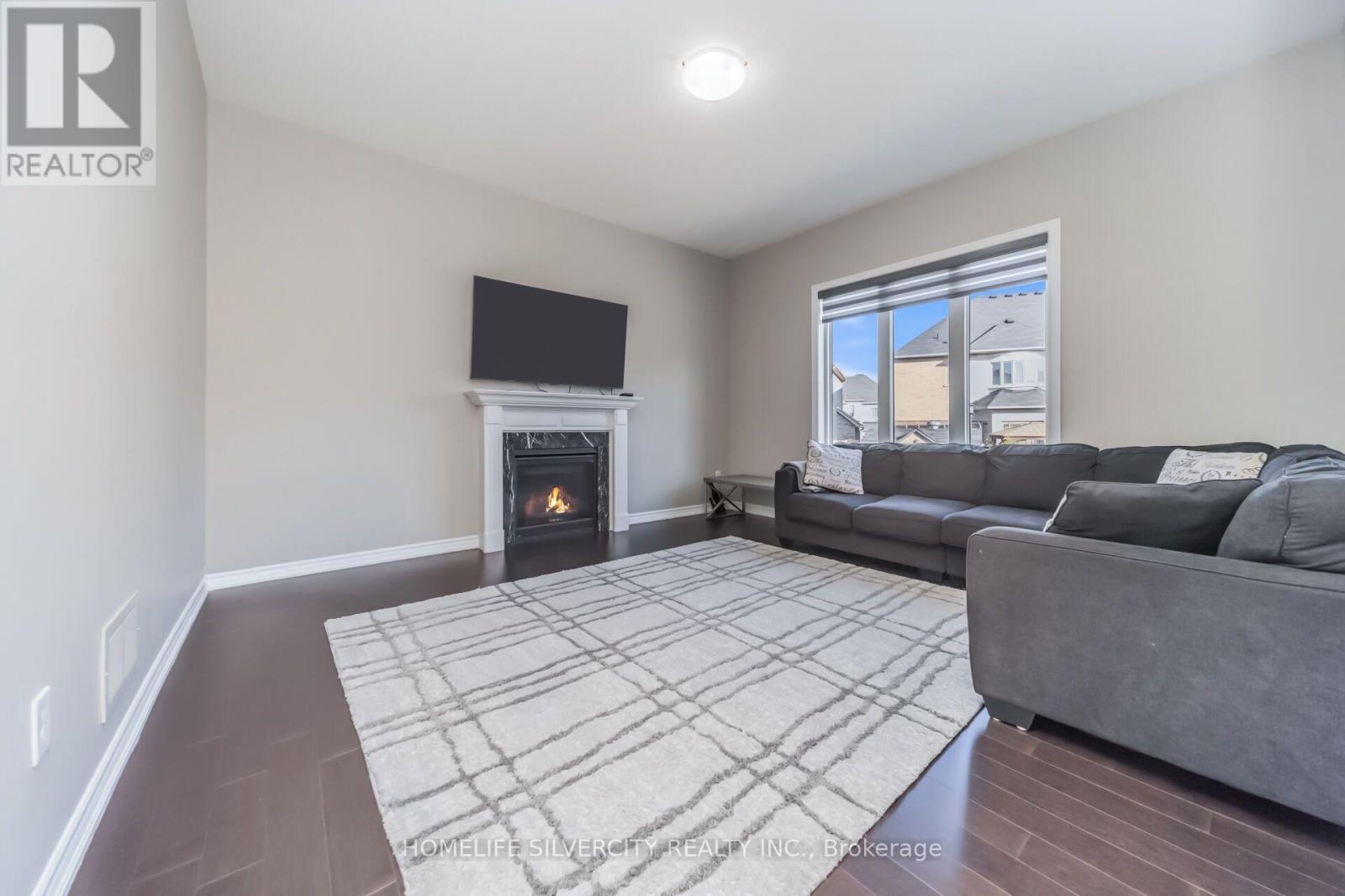 14 Observatory Crescent, Brampton, ON - Indoor Photo Showing Living Room With Fireplace