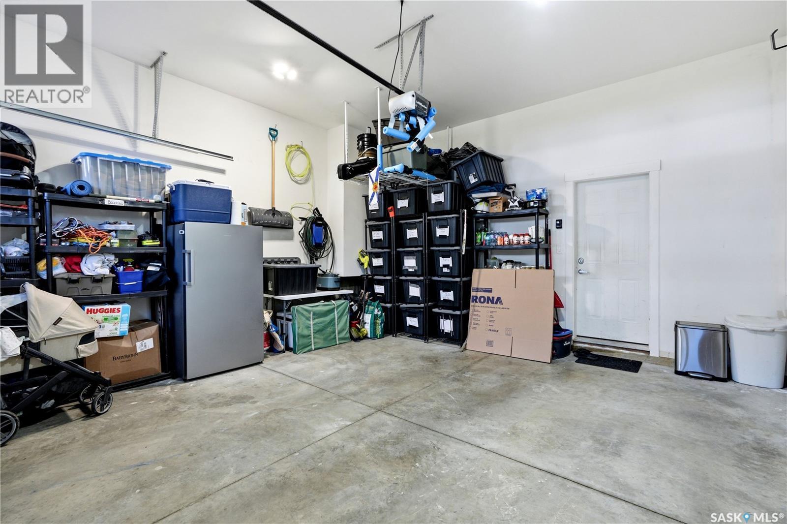 158 3220 11Th Street W, Saskatoon, SK - Indoor Photo Showing Garage