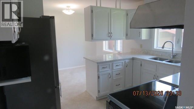 335 Wedge Road, Saskatoon, SK - Indoor Photo Showing Kitchen With Double Sink
