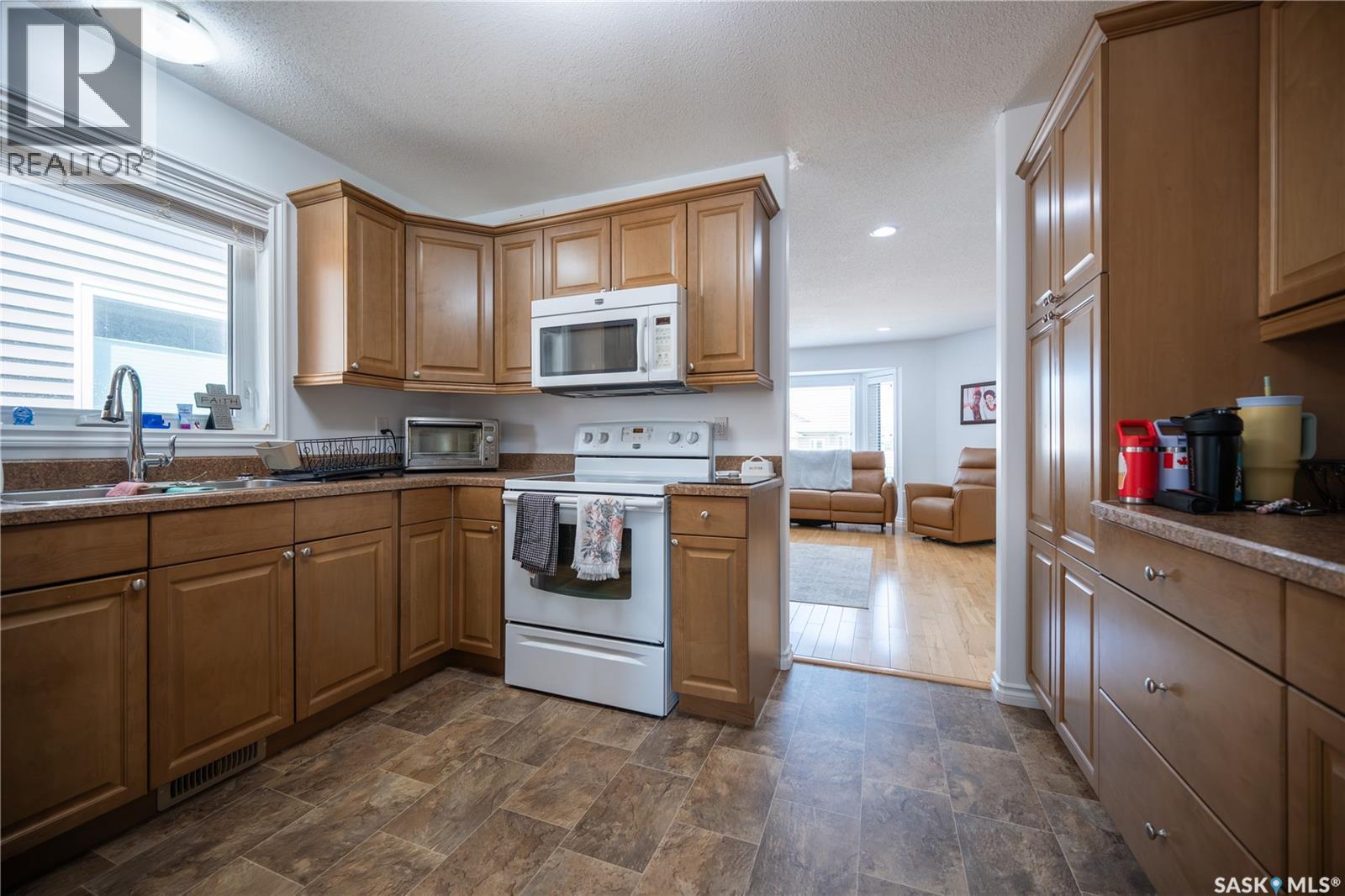 117 Good Spirit Crescent, Yorkton, SK - Indoor Photo Showing Kitchen With Double Sink