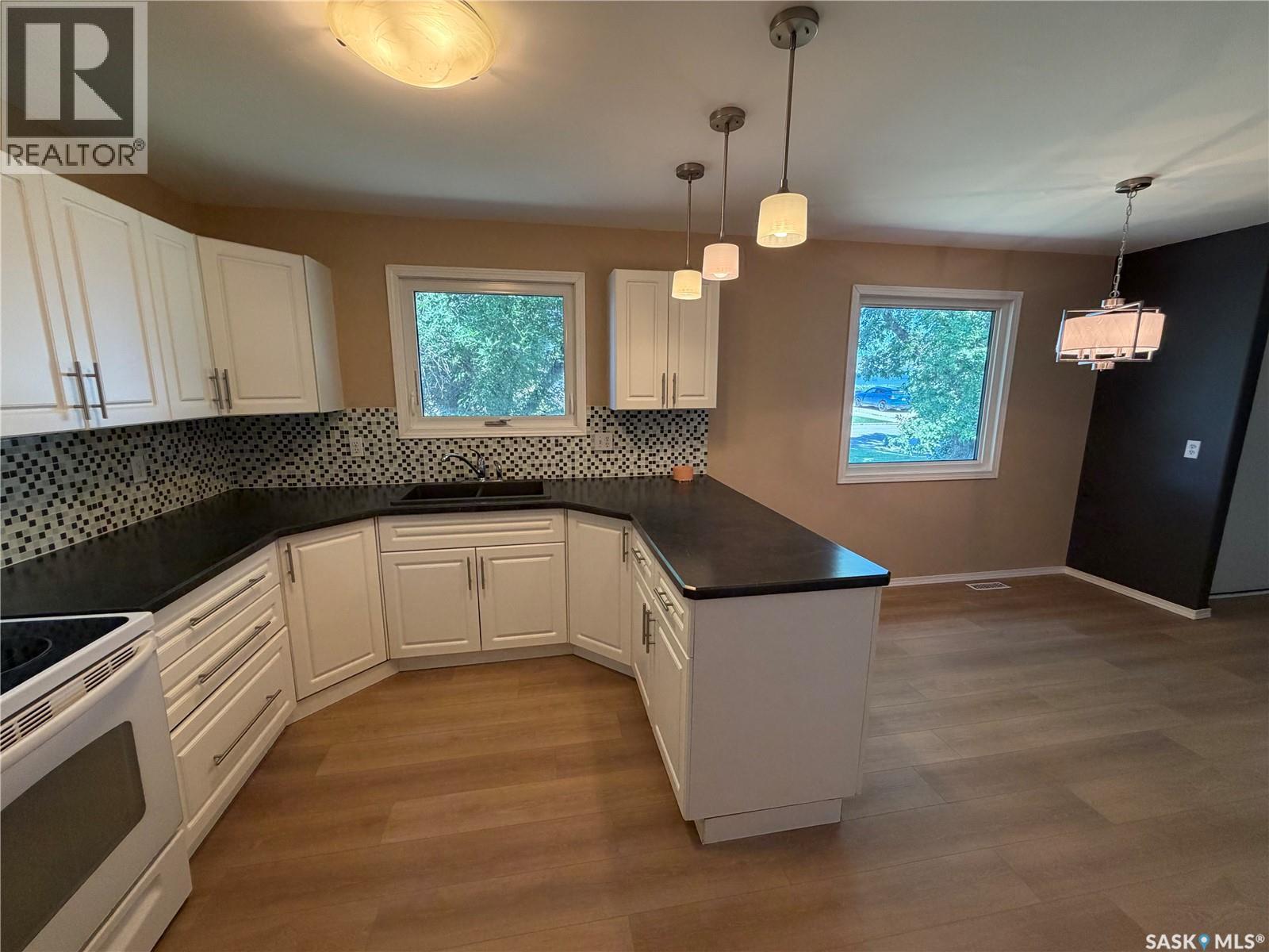 25 Souris Avenue, Redvers, SK - Indoor Photo Showing Kitchen With Double Sink