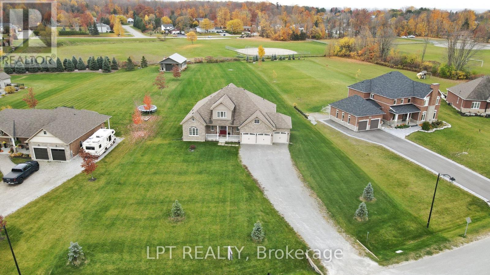 12 Plowright Road, Springwater, ON - Outdoor With Facade With View