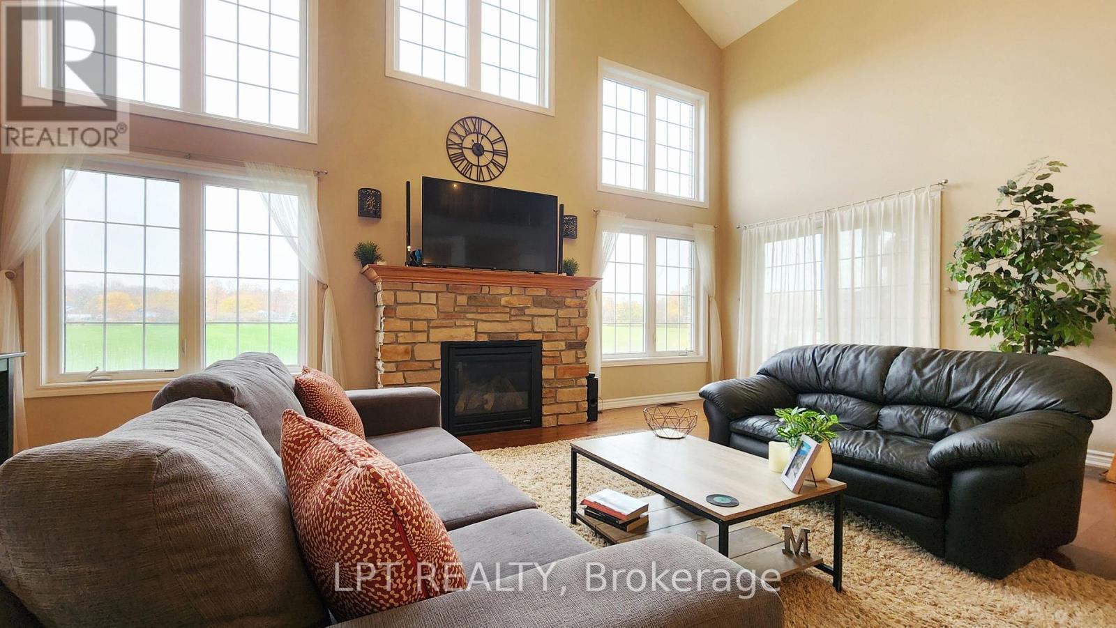12 Plowright Road, Springwater, ON - Indoor Photo Showing Living Room With Fireplace
