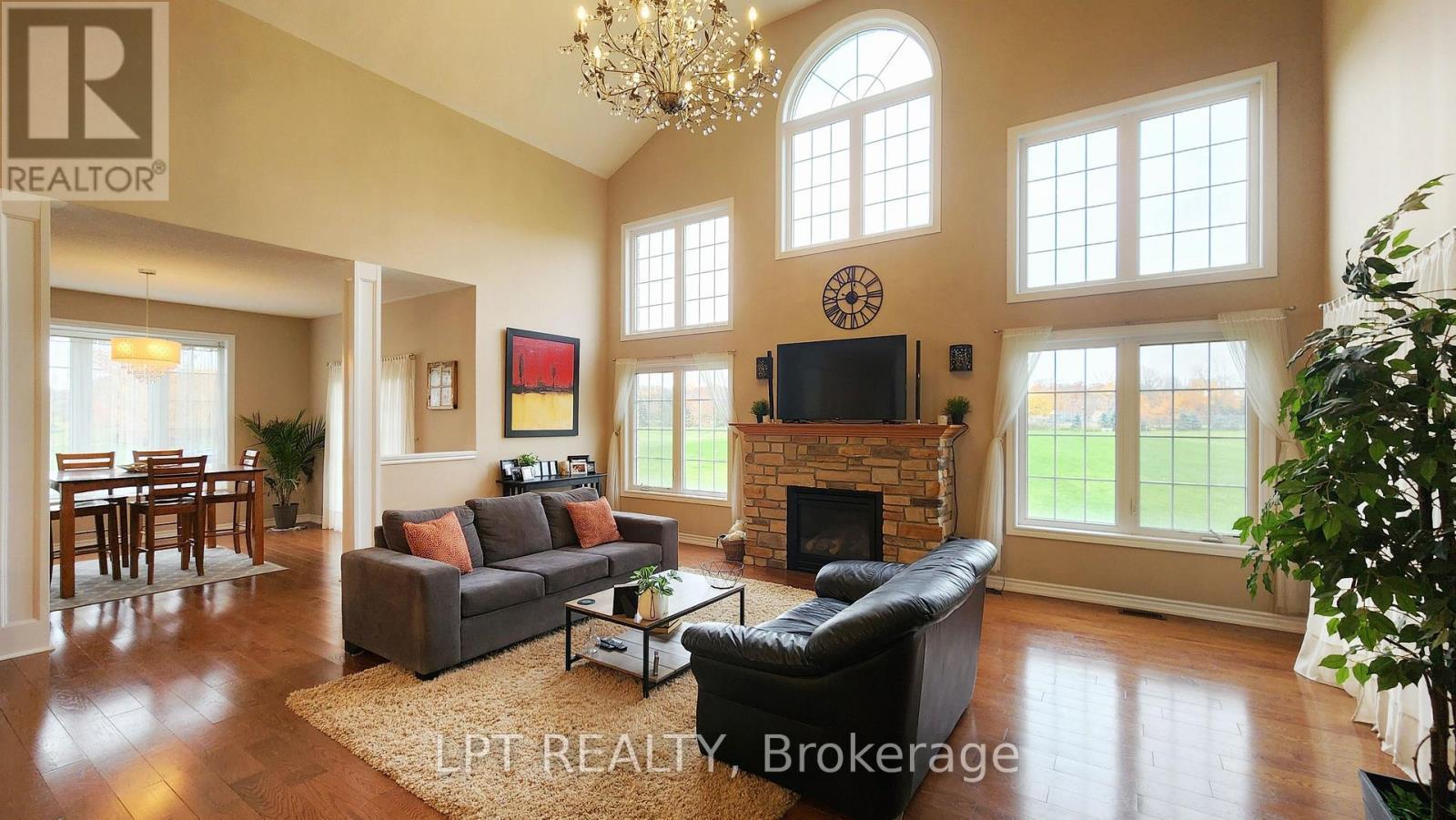 12 Plowright Road, Springwater, ON - Indoor Photo Showing Living Room With Fireplace