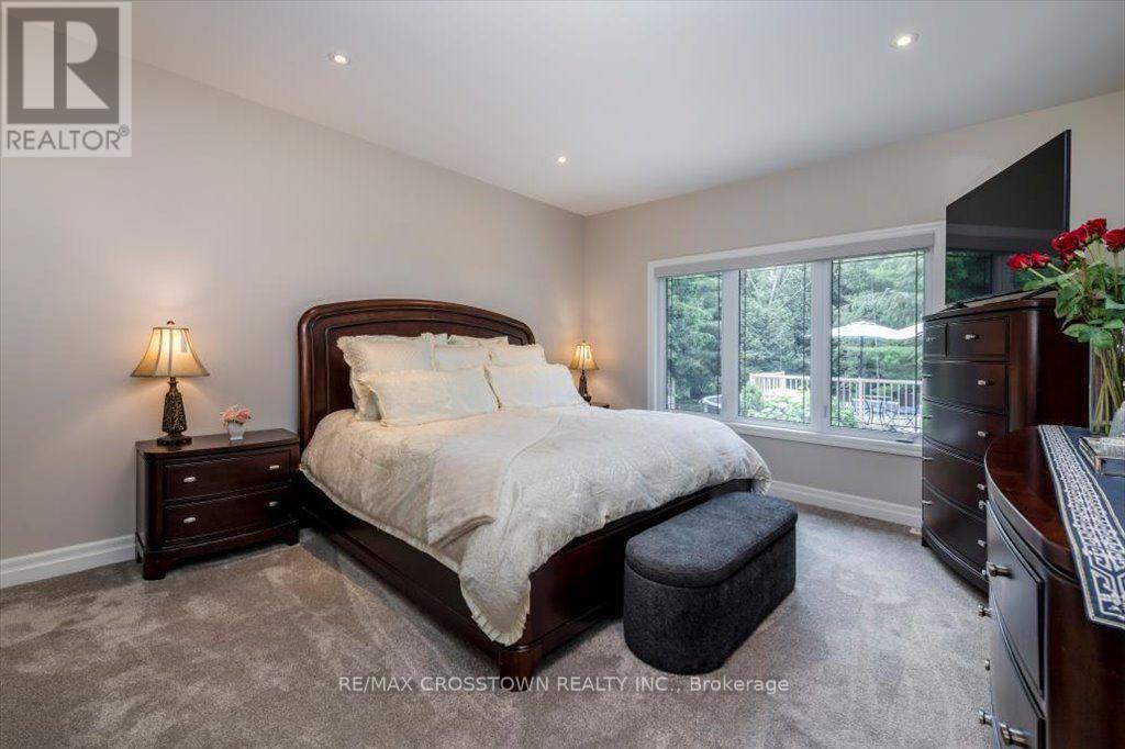 Primary Suite - 5 Pine Hill Drive, Springwater, ON - Indoor Photo Showing Bedroom