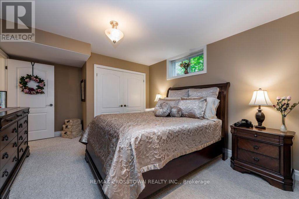 Guest suite with double closets - 5 Pine Hill Drive, Springwater, ON - Indoor Photo Showing Bedroom