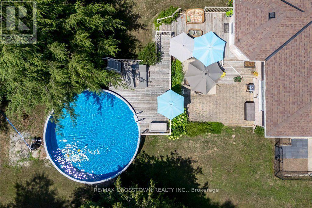 Rear yard arial view - 5 Pine Hill Drive, Springwater, ON - Outdoor With Above Ground Pool