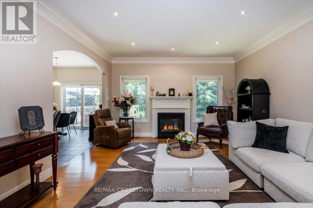 Livingroom - 5 Pine Hill Drive, Springwater, ON - Indoor Photo Showing Living Room With Fireplace