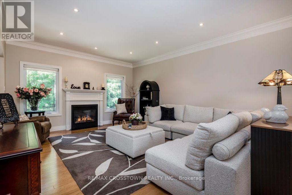 Livingroom - 5 Pine Hill Drive, Springwater, ON - Indoor Photo Showing Living Room With Fireplace