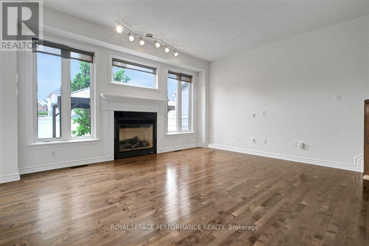 171 Trail Side Circle, Ottawa, ON - Indoor Photo Showing Living Room With Fireplace