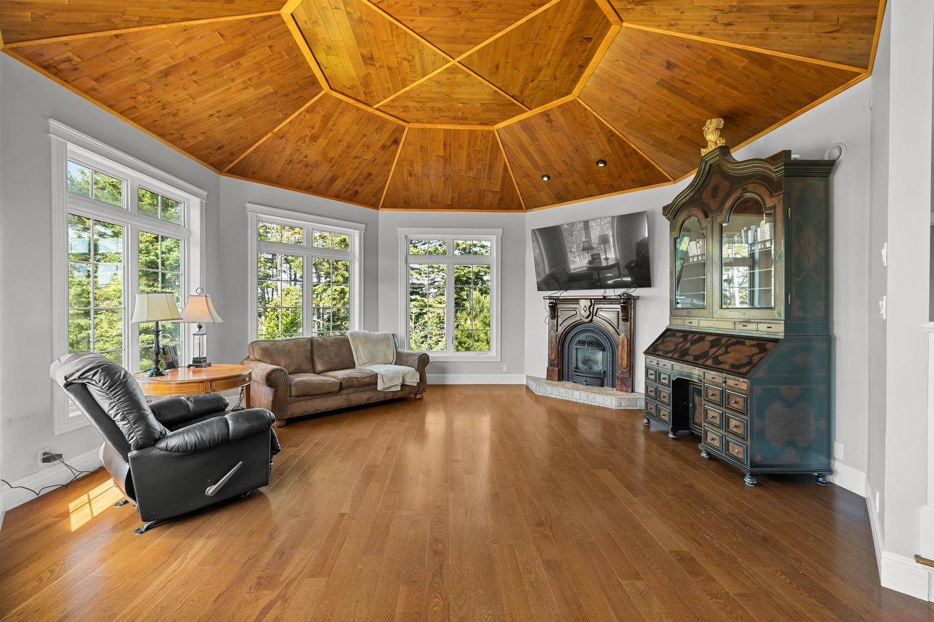 40 Sunset Drive, Souris, PE - Indoor Photo Showing Living Room With Fireplace