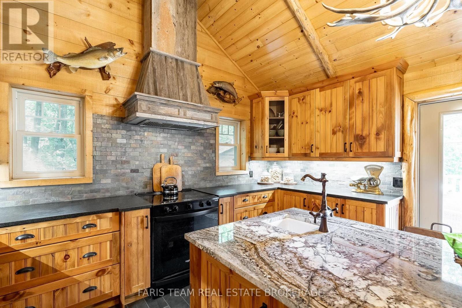 108 Shoreline Road, Tiny, ON - Indoor Photo Showing Kitchen With Double Sink