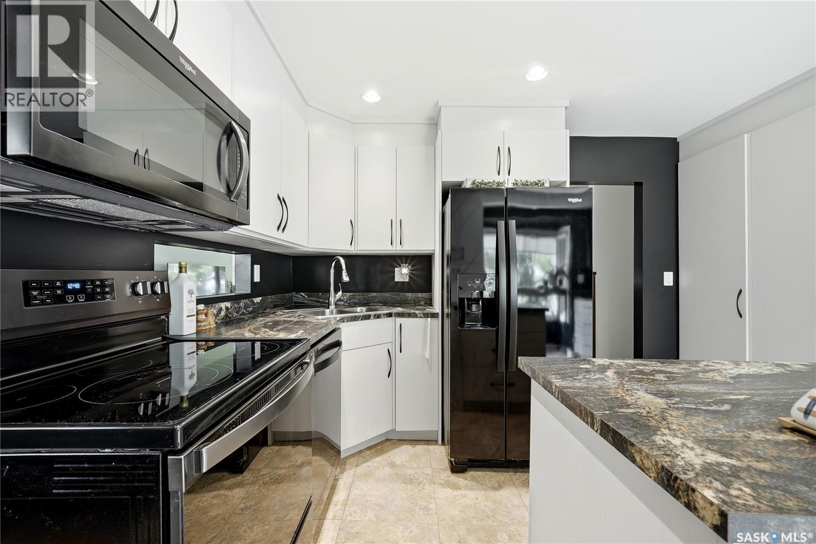 111 Bell Street, Regina, SK - Indoor Photo Showing Kitchen With Double Sink
