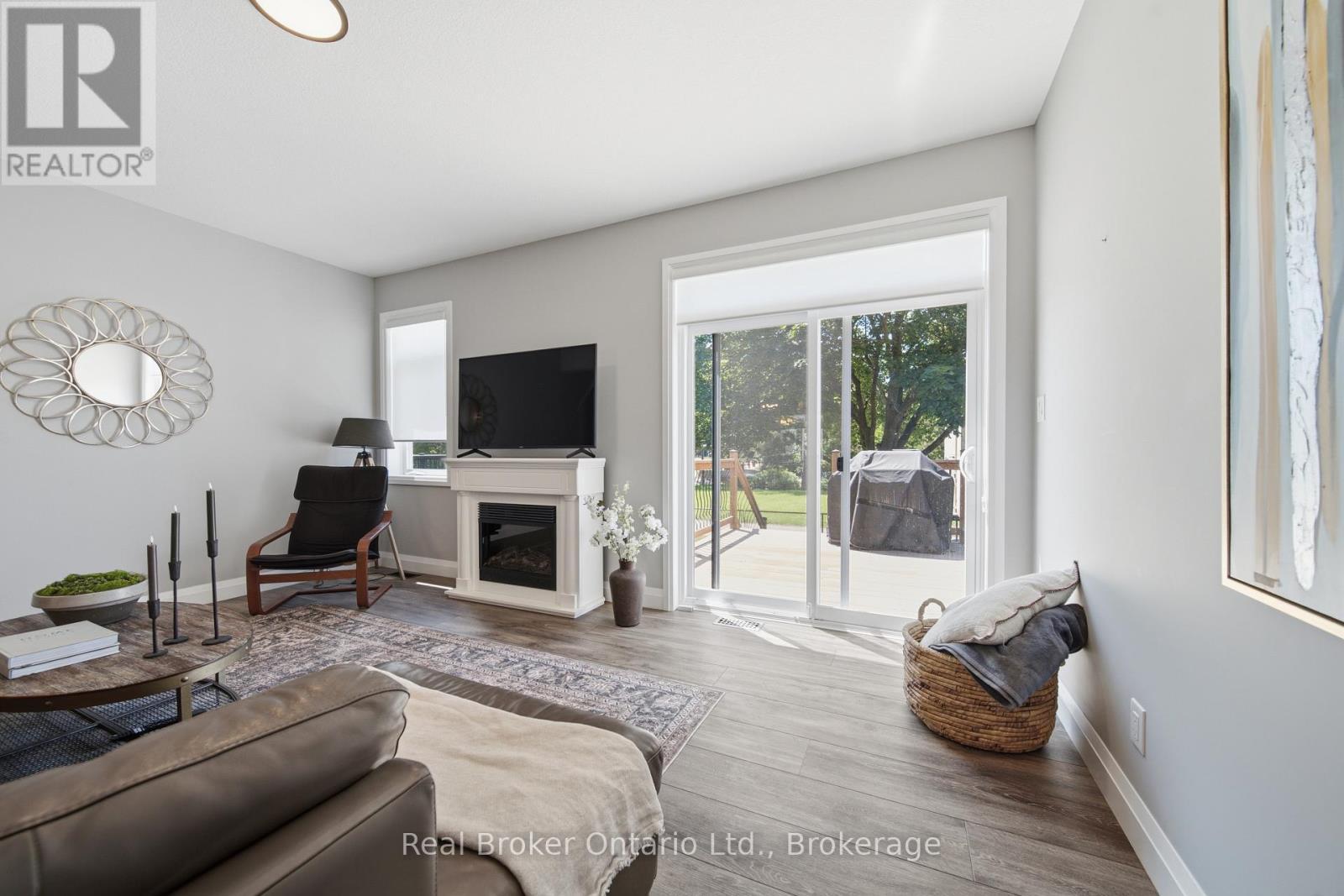 103 Stephenson Way, Minto, ON - Indoor Photo Showing Living Room With Fireplace