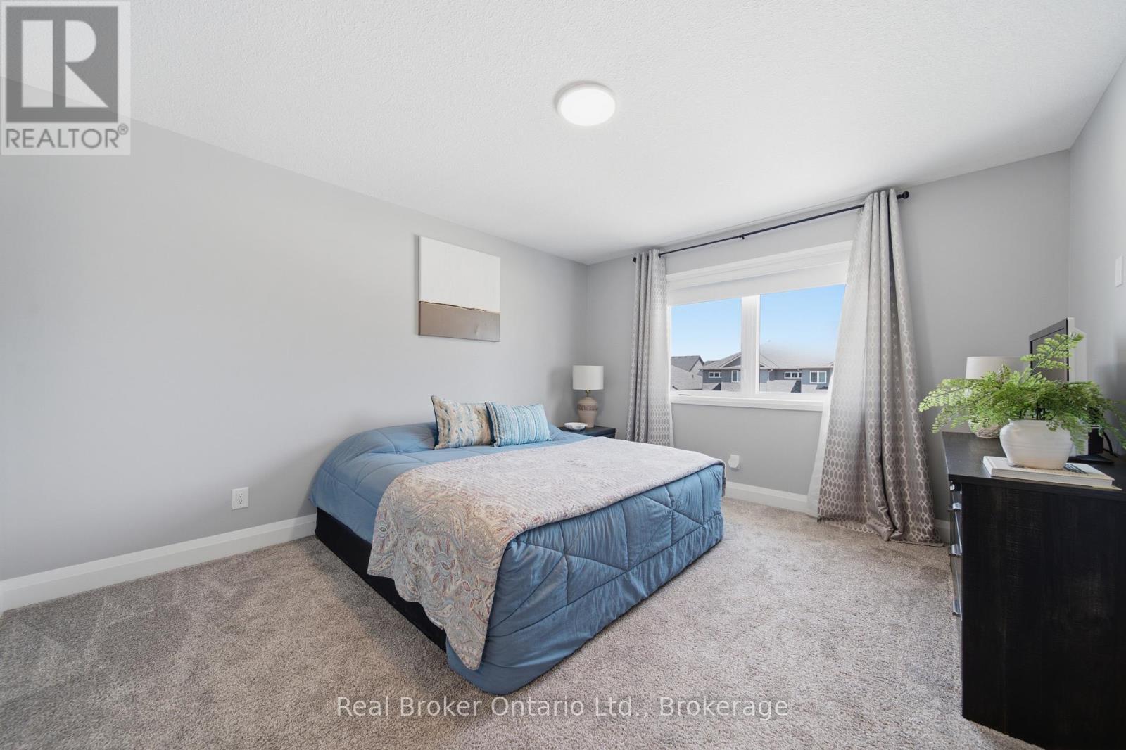 103 Stephenson Way, Minto, ON - Indoor Photo Showing Bedroom