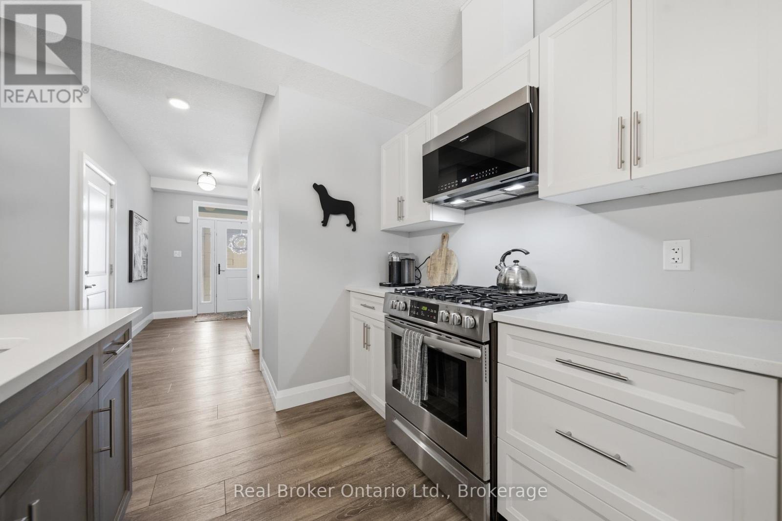 103 Stephenson Way, Minto, ON - Indoor Photo Showing Kitchen With Upgraded Kitchen