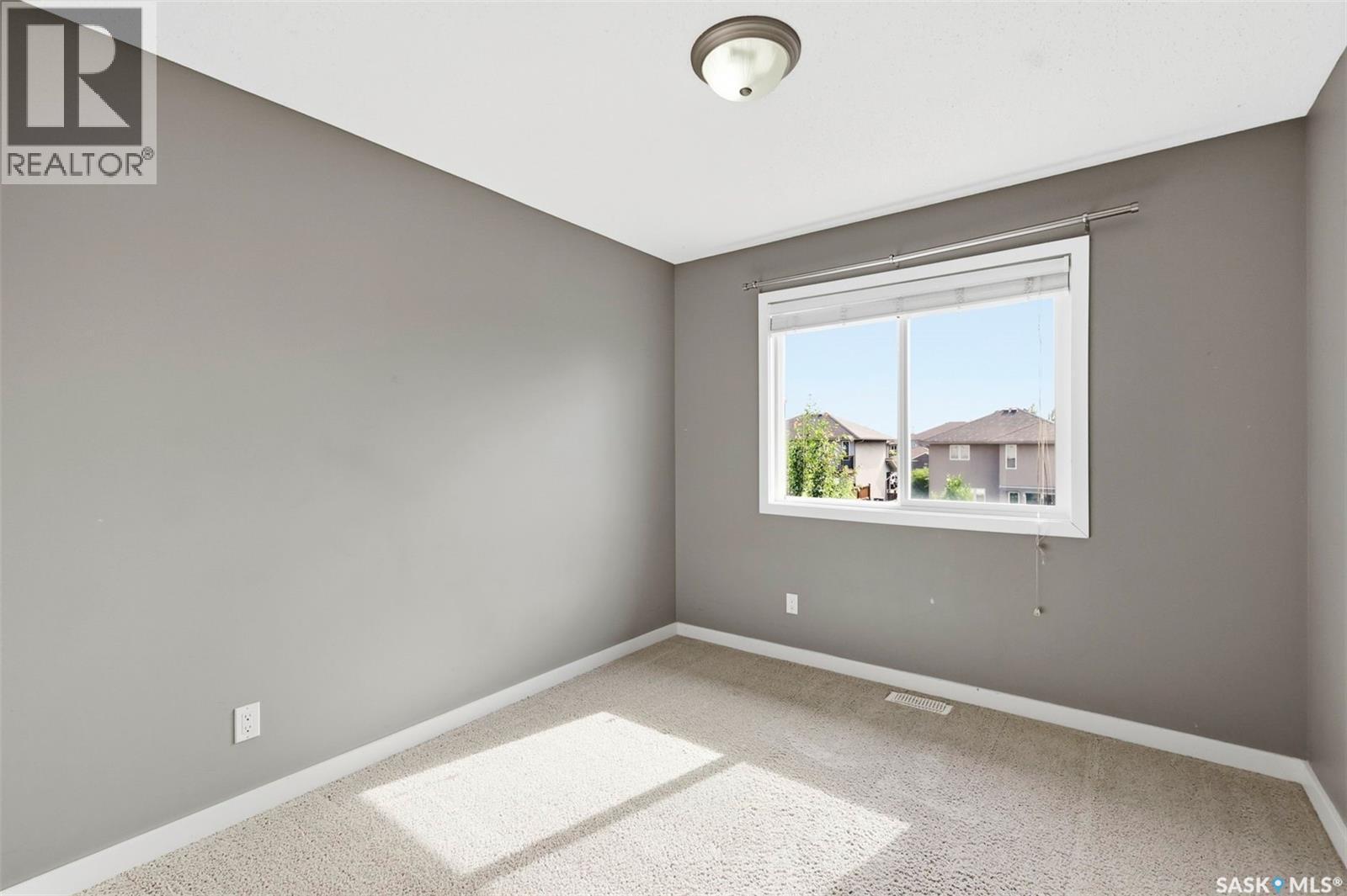 916 Stonebridge Common, Saskatoon, SK - Indoor Photo Showing Other Room