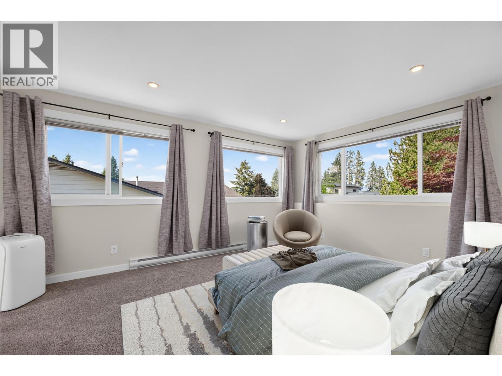 **Virtually Staged** suite bedroom 2 - 2220 Thacker Drive, West Kelowna, BC - Indoor Photo Showing Bedroom