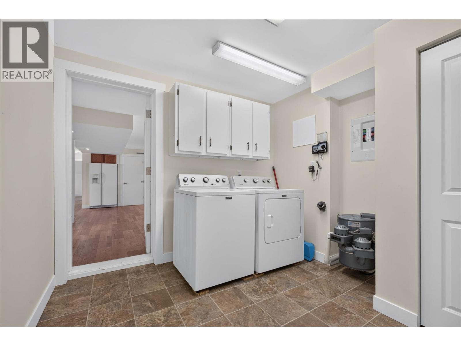 suite laundry and mud room, separate entrance - 2220 Thacker Drive, West Kelowna, BC - Indoor Photo Showing Laundry Room