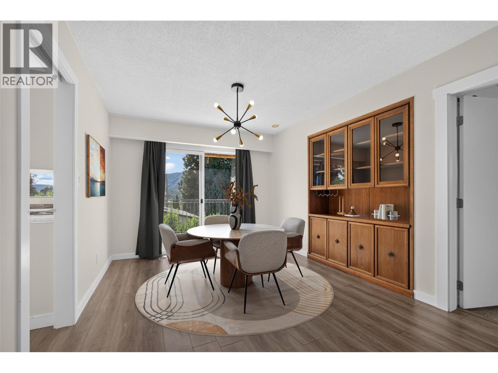 **Virtually Staged** primary bedroom - 2220 Thacker Drive, West Kelowna, BC - Indoor Photo Showing Bedroom