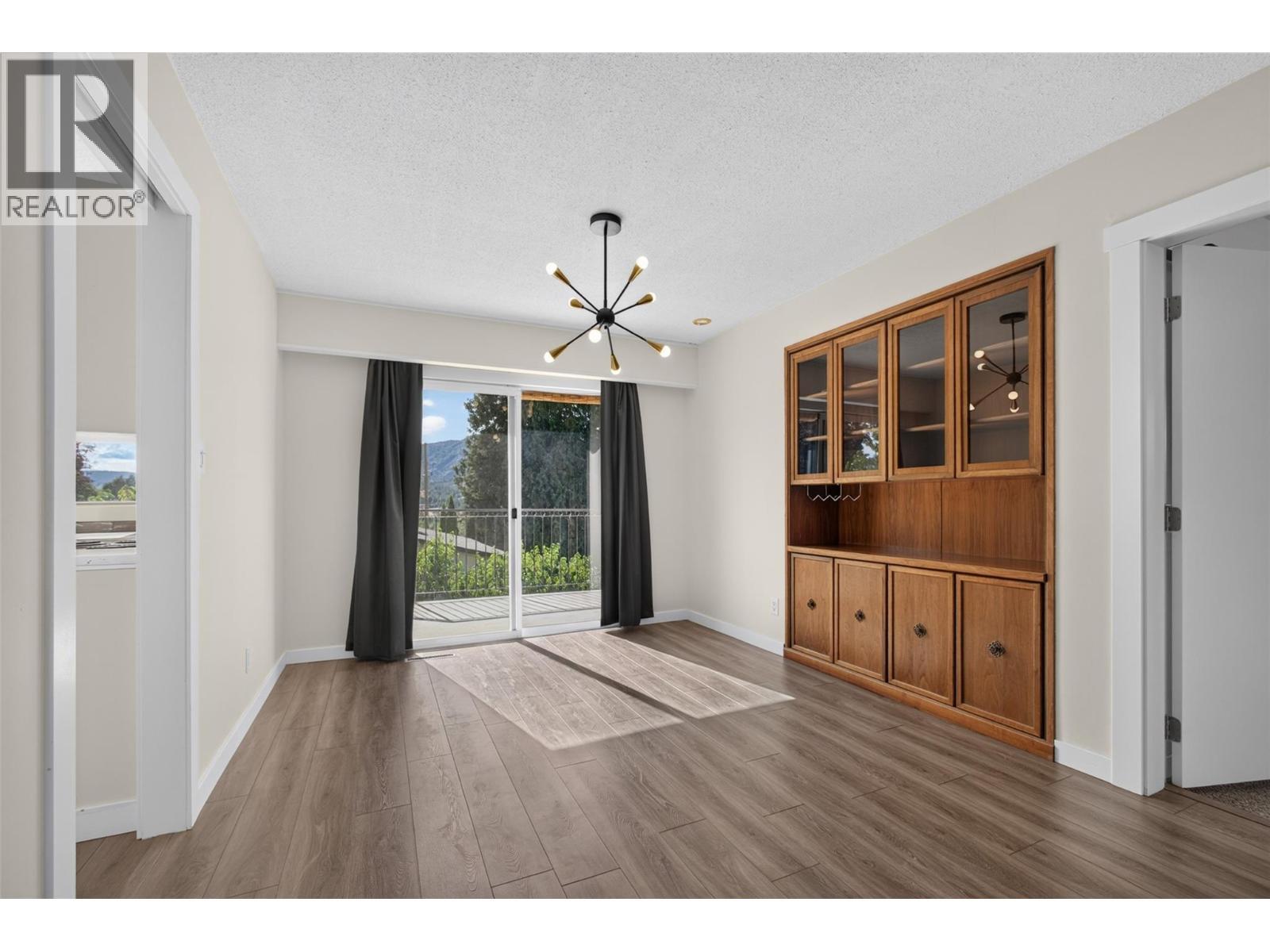 **Virtually Staged** 2nd bedroom upstairs - 2220 Thacker Drive, West Kelowna, BC - Indoor Photo Showing Bedroom