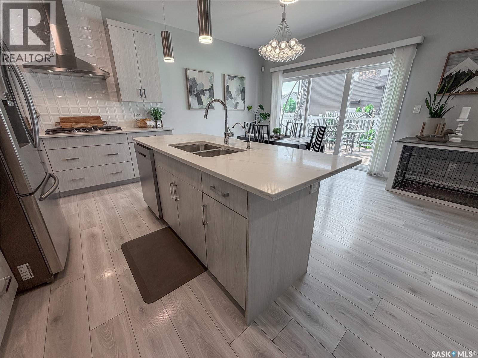 3755 Gee Crescent, Regina, SK - Indoor Photo Showing Kitchen With Double Sink
