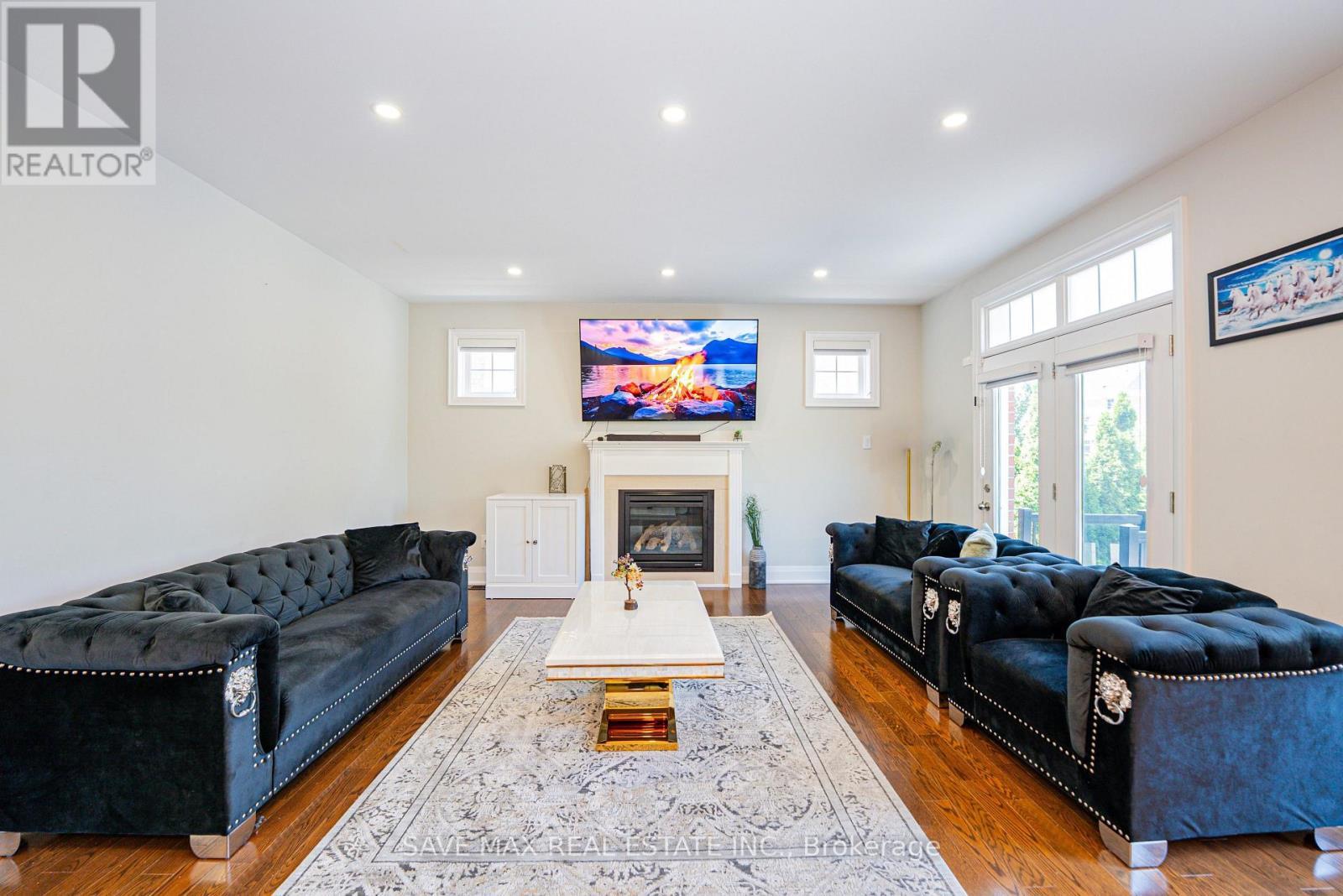 47 Legendary Circle, Brampton, ON - Indoor Photo Showing Other Room With Fireplace