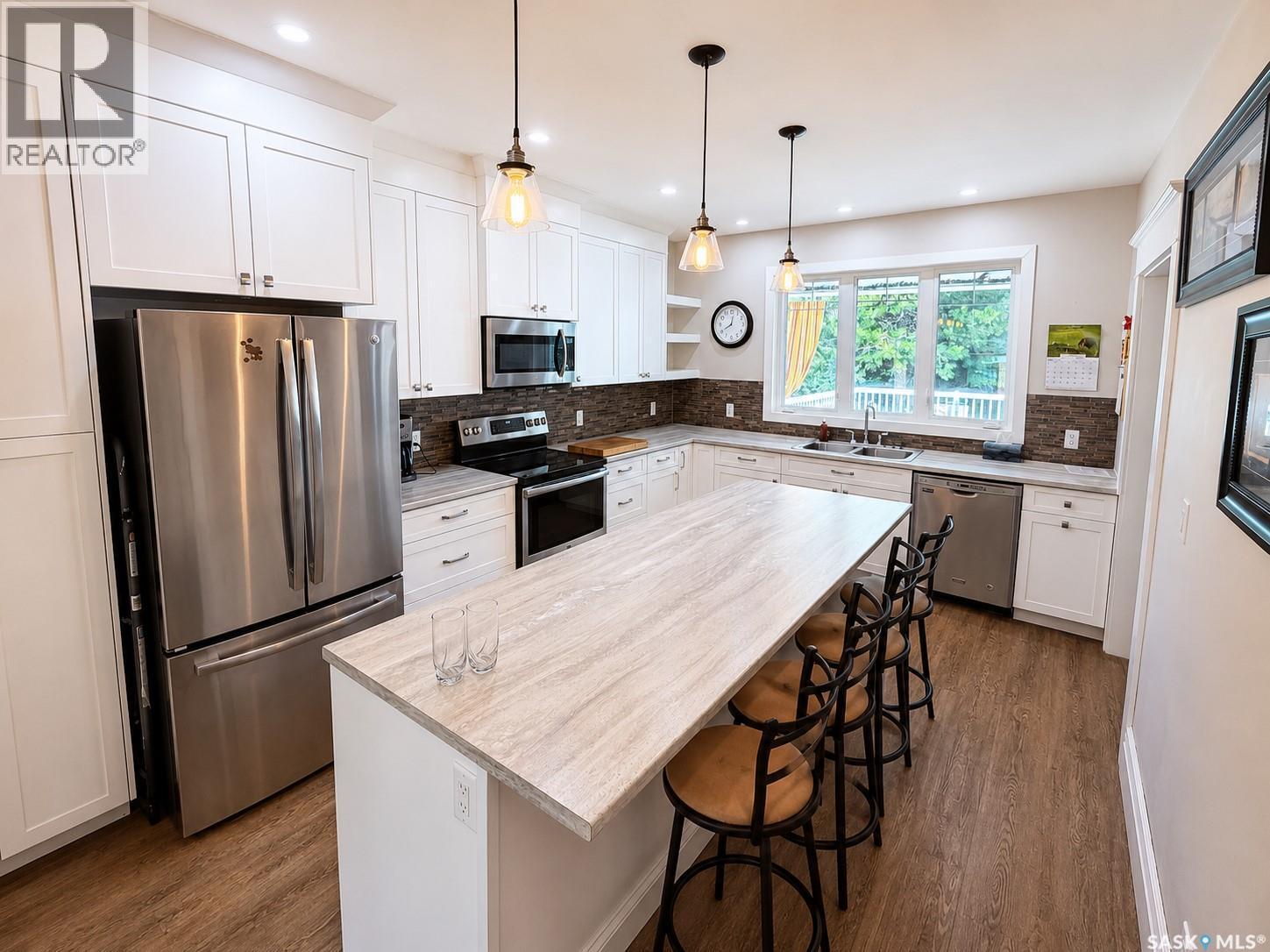 205 3Rd Avenue, Harris, SK - Indoor Photo Showing Kitchen With Double Sink With Upgraded Kitchen