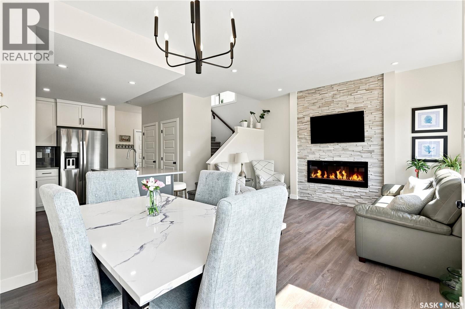 850 Brighton Gate, Saskatoon, SK - Indoor With Fireplace