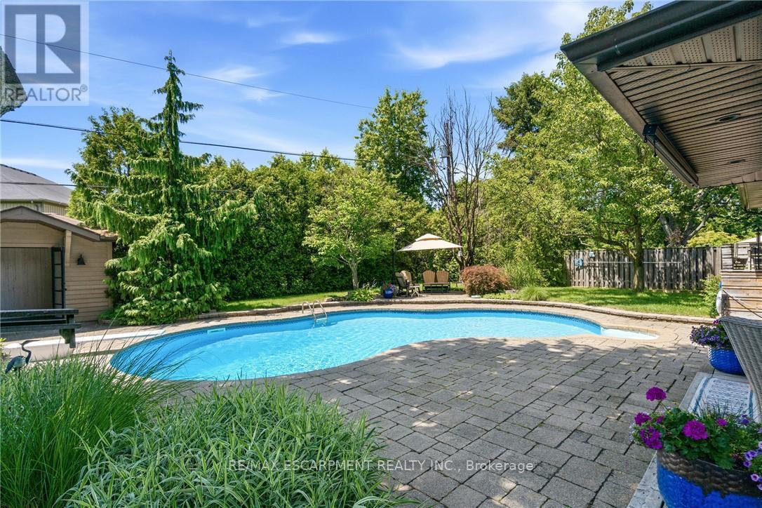 302 Harmony Road, Hamilton, ON - Outdoor With In Ground Pool With Deck Patio Veranda With Backyard