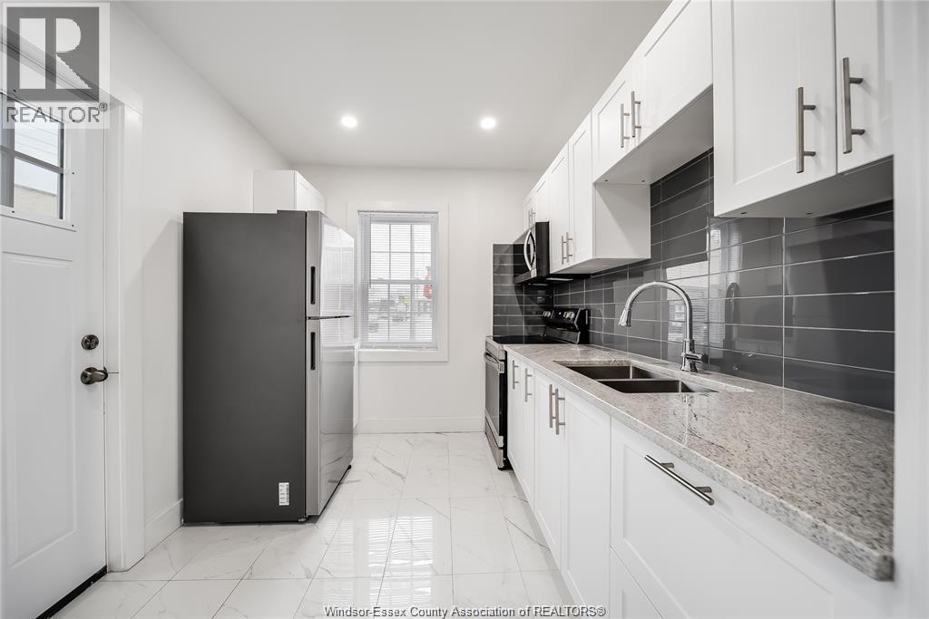 1691 Dougall, Windsor, ON - Indoor Photo Showing Kitchen With Double Sink