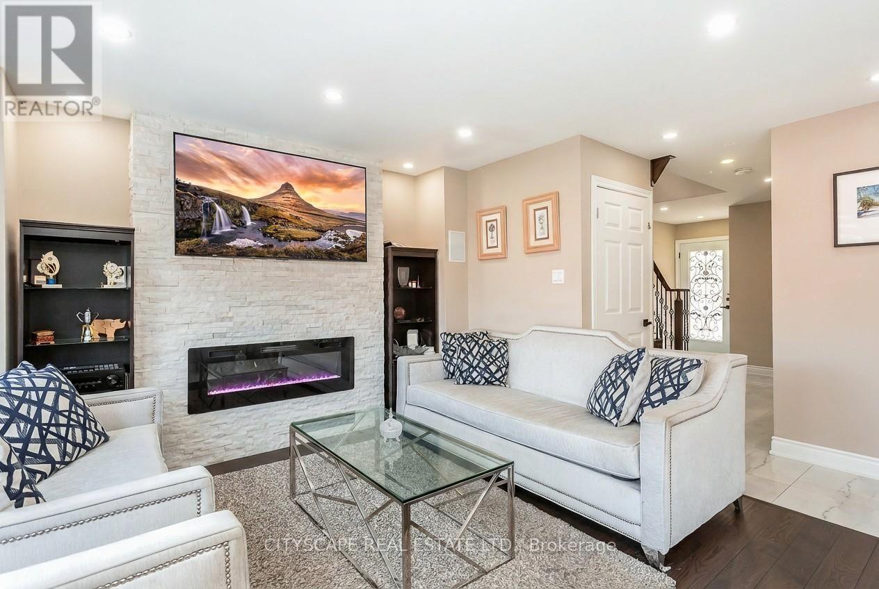 5259 Astwell Avenue, Mississauga, ON - Indoor Photo Showing Living Room With Fireplace