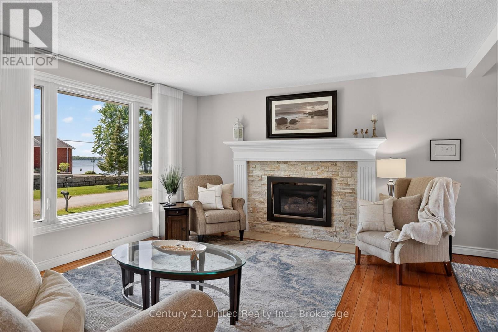 1190 Nuforest Drive, Selwyn, ON - Indoor Photo Showing Living Room With Fireplace