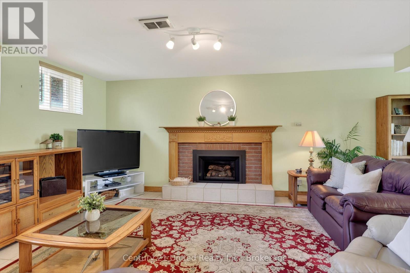 1190 Nuforest Drive, Selwyn, ON - Indoor Photo Showing Living Room With Fireplace