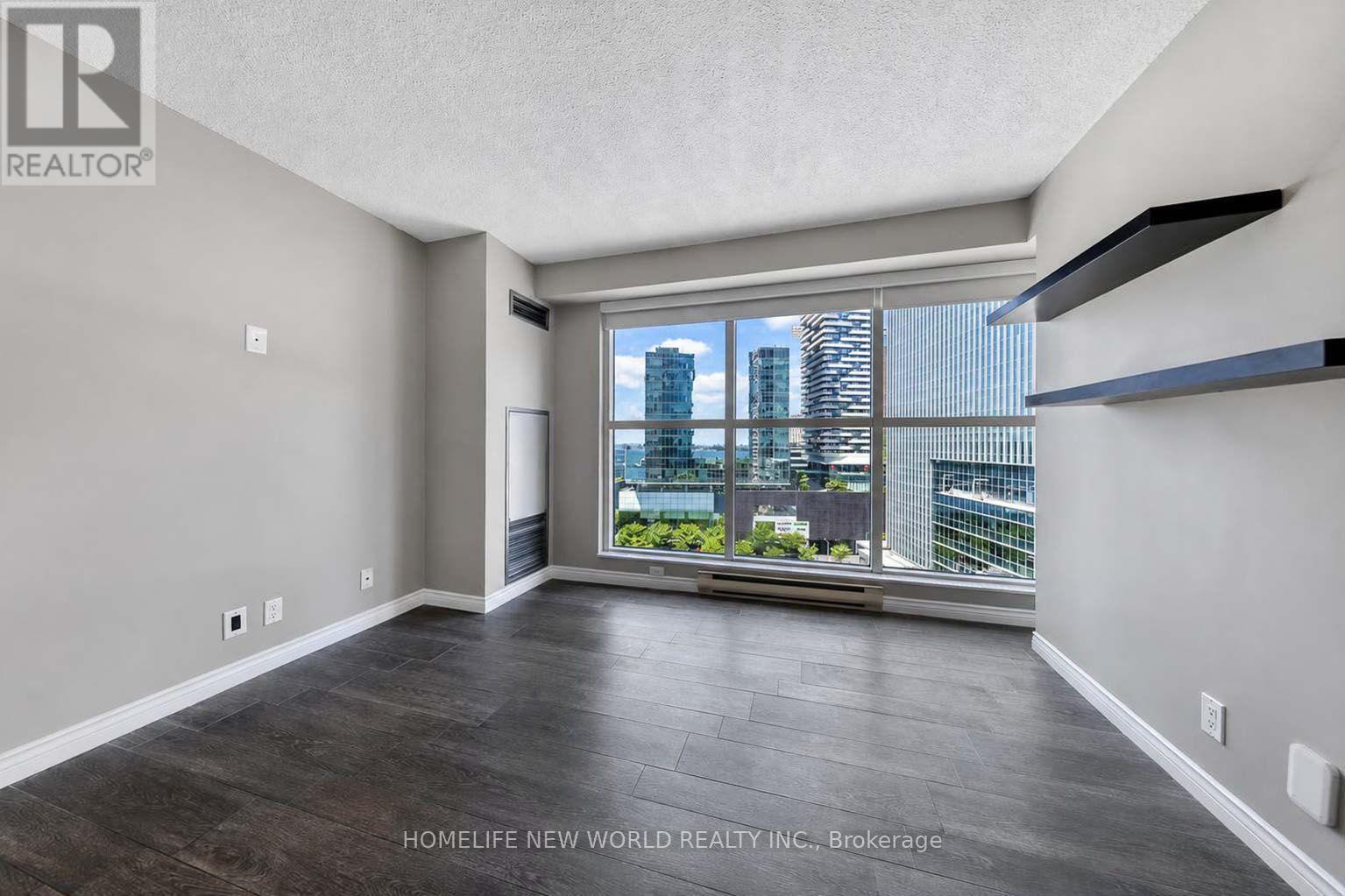 1602 - 77 Harbour Square, Toronto, ON - Indoor With Fireplace