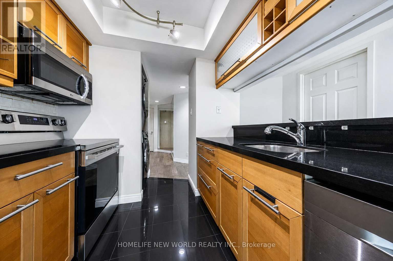 1602 - 77 Harbour Square, Toronto, ON - Indoor Photo Showing Kitchen With Double Sink
