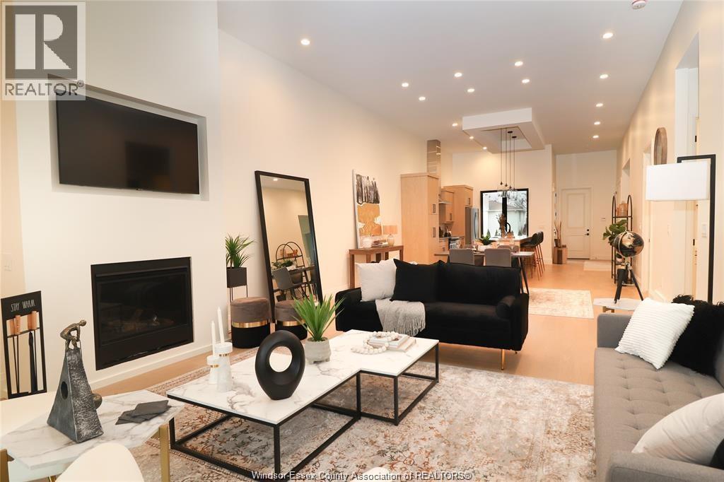 654 Lily Mac, Windsor, ON - Indoor Photo Showing Living Room With Fireplace