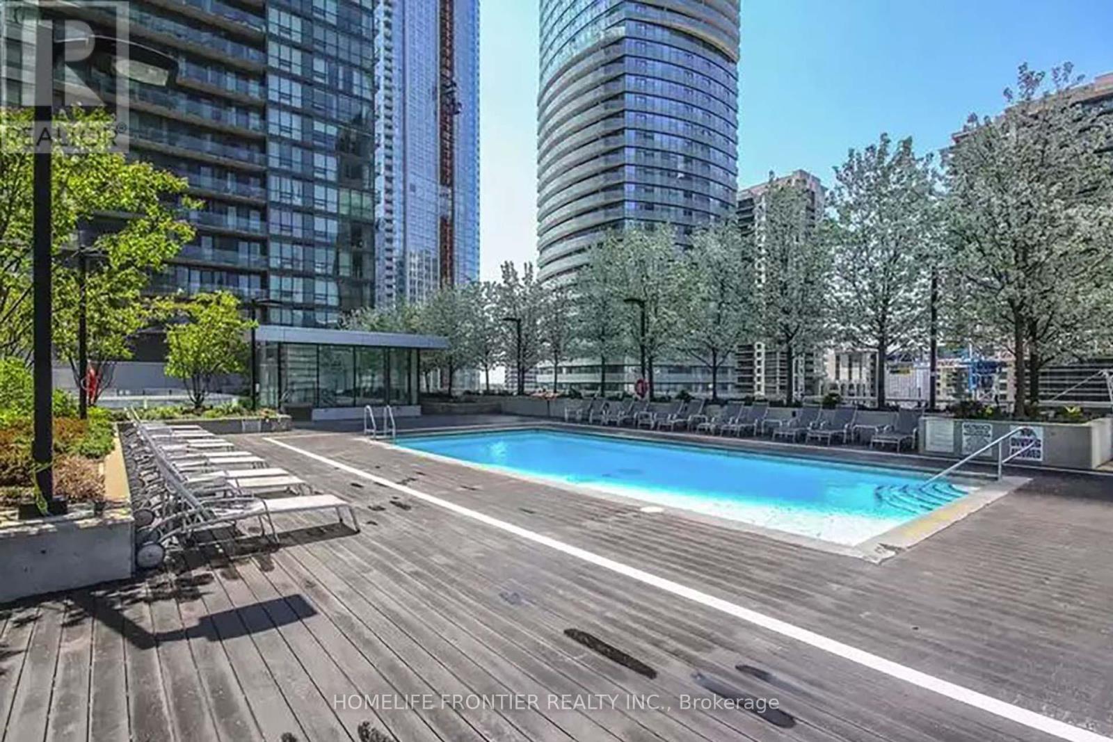 2111 - 65 Bremner Boulevard, Toronto, ON - Outdoor With In Ground Pool