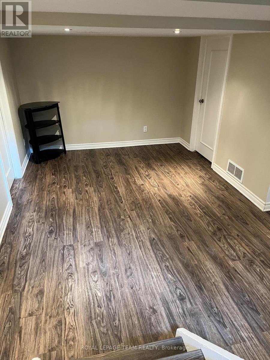 Open area in basement at bottom of stairs - 9 Tower Road E, Ottawa, ON - Indoor Photo Showing Other Room