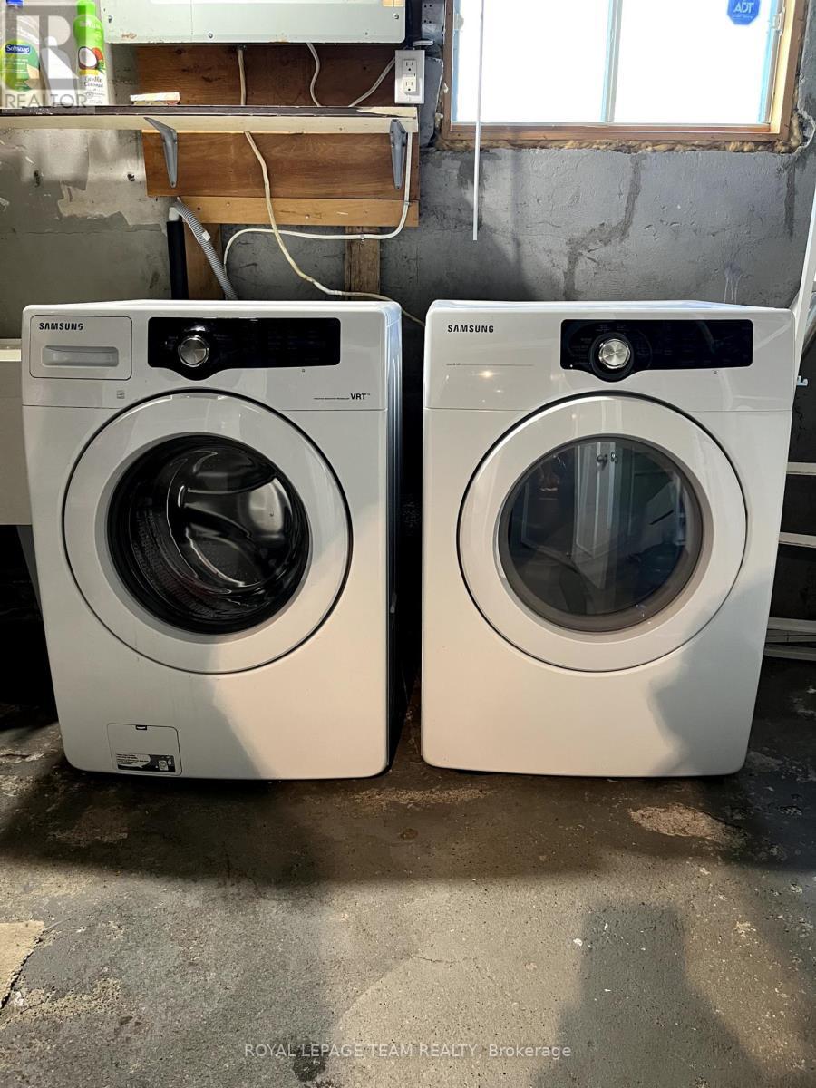 Laundry in basement, front loading washer/dryer - 9 Tower Road E, Ottawa, ON - Indoor Photo Showing Laundry Room