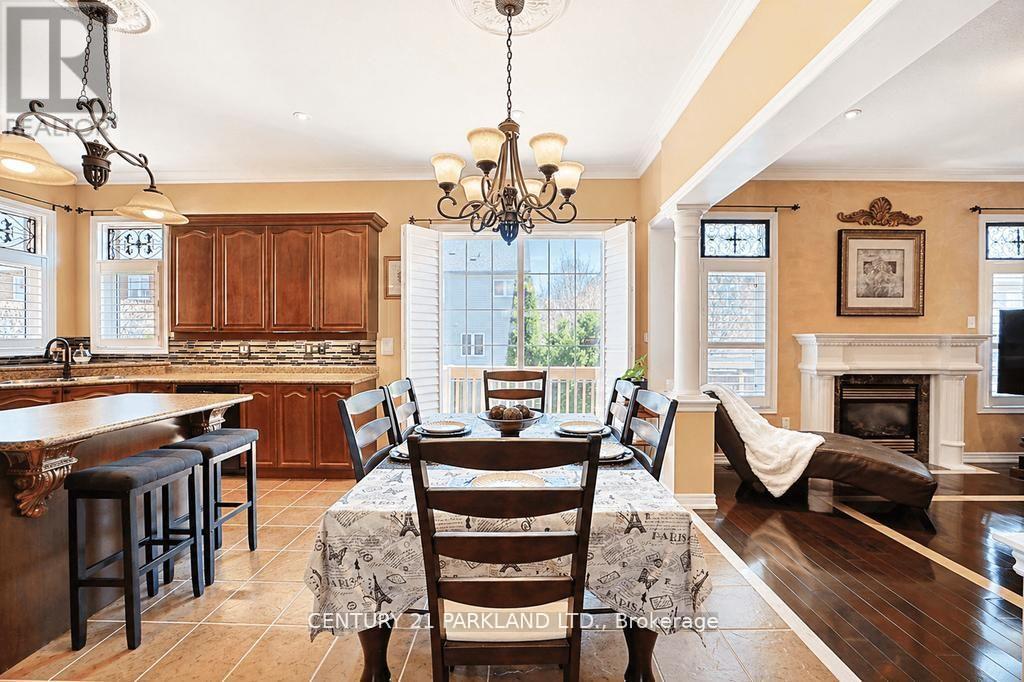 2020 Solar Place, Oshawa, ON - Indoor Photo Showing Dining Room With Fireplace