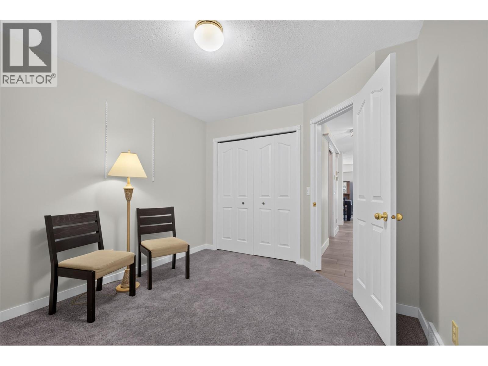 Secondary bedroom on main level *virtually staged* - 602 Glenmeadows Road, Kelowna, BC - Indoor
