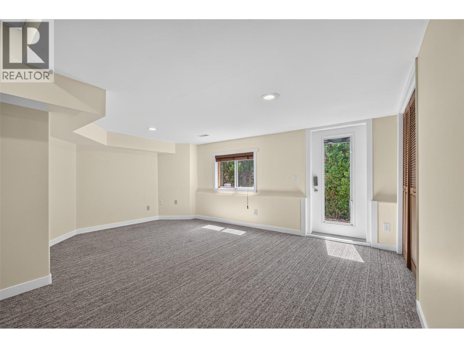 5th bedroom/ Recreation room with separate entrance - 602 Glenmeadows Road, Kelowna, BC - Indoor Photo Showing Other Room