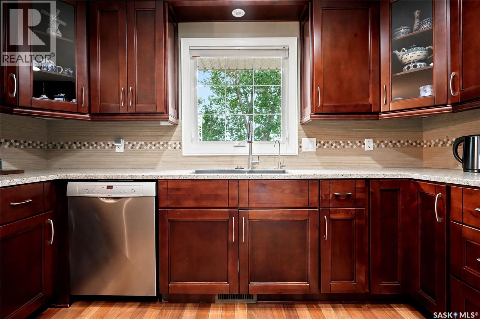 22 Wesson Bay, Regina, SK - Indoor Photo Showing Kitchen With Double Sink